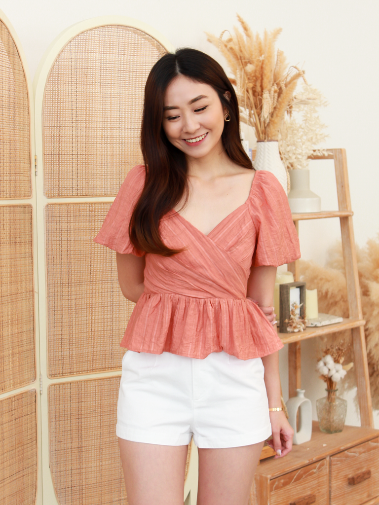 Burnt orange peplum sales top